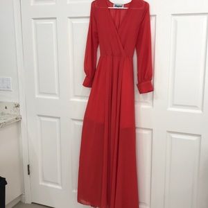 Long, sheet dress with sleeves.